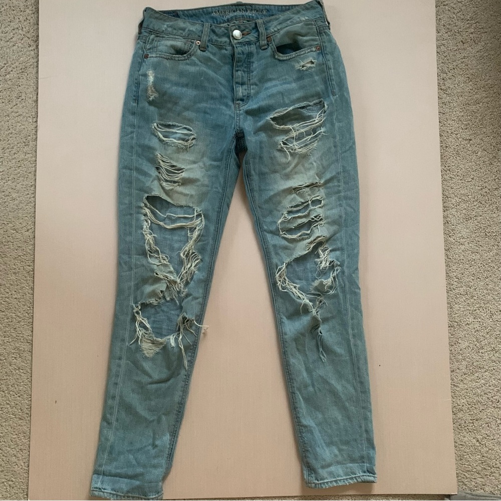 American Eagle Outfitters EXTREMELY ripped boyfriend jeans in Waist Size 25”
